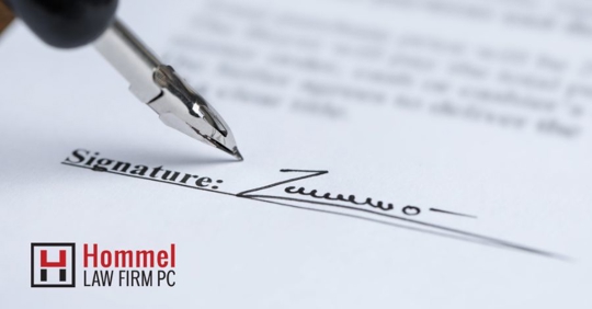 pen signing a severance agreement